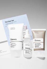 The Ordinary The Clear Set products arranged beside the packaging