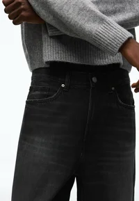 Bershka black jeans, waist and front pocket detail