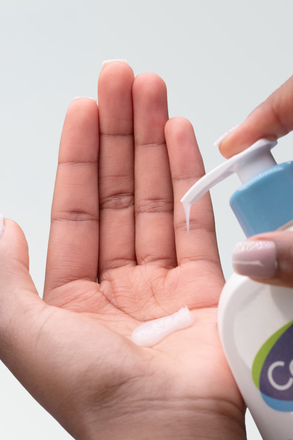 Cetaphil Gentle Skin Cleanser dispensed into a hand