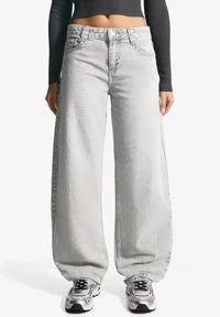 Bershka grey balloon baggy jeans, front view on model
