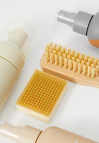 Detail of UGG shoe care brush and cleaning block