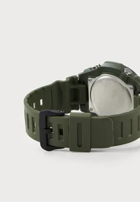 Casio green watch, strap and case back