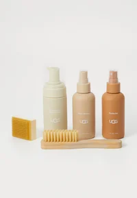 UGG shoe care kit bottles, brush and cleaning block