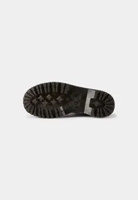 Dr. Martens Jadon boot, treaded outsole