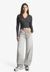 Bershka grey balloon baggy jeans styled on model