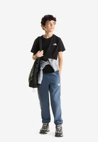 The North Face black short-sleeved T-shirt worn by a model