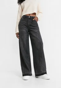 Front view of Black Denim low-rise wide-leg jeans