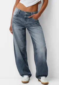 Bershka dark blue balloon baggy jeans, front view on model