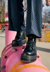 Dr. Martens Jadon boots styled with wide-leg jeans