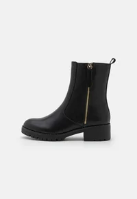 Side view of Anna Field black ankle boot with side zip and block heel