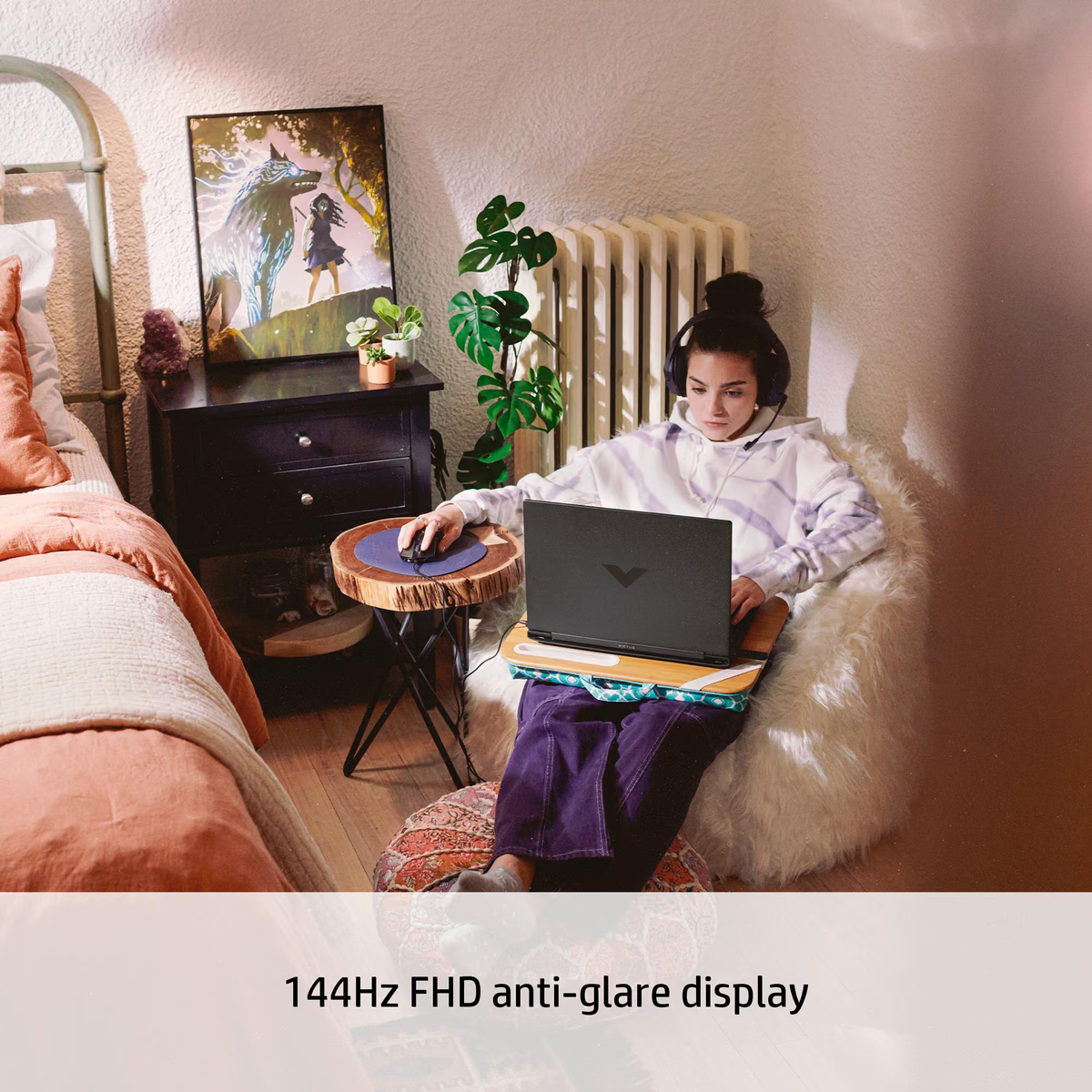HP Victus gaming laptop in a home setting, with 144Hz FHD anti-glare display promotional text