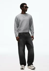 Bershka black baggy jeans styled with a grey sweatshirt