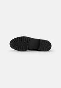 Outsole of Anna Field black ankle boot