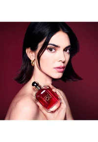 Model holding Emporio Armani Power of You perfume