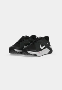 Nike Hybrid women's black and white training shoes, pair view